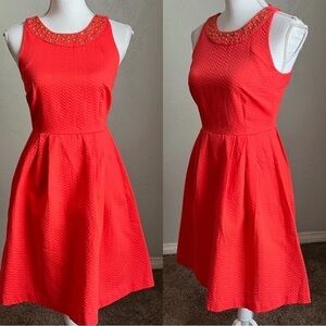 Beautiful rich coral fit and flare  beaded halter dress
